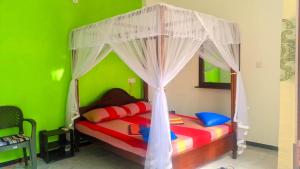 Katil atau katil-katil dalam bilik di Mila Rest Garden