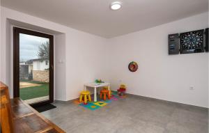 Televízia a/alebo spoločenská miestnosť v ubytovaní 3 Bedroom Villa In Pula