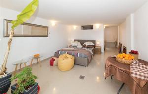 Postel nebo postele na pokoji v ubytování Three-Bedroom Holiday Home In Labin