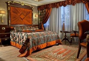 מיטה או מיטות בחדר ב-Ottoman's Life Hotel S Class