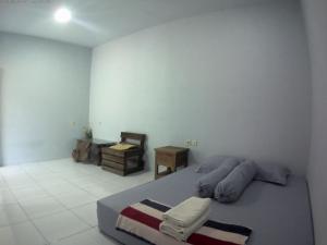 Ένα ή περισσότερα κρεβάτια σε δωμάτιο στο Hatha home stay