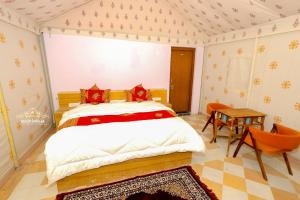 Desert Popular Resort & Camp客房内的一张或多张床位