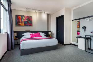 Postel nebo postele na pokoji v ubytování TEEDO Hotel Kuala Lumpur