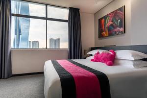 Postel nebo postele na pokoji v ubytování TEEDO Hotel Kuala Lumpur