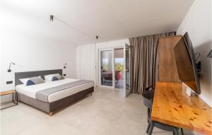Posteľ alebo postele v izbe v ubytovaní Cozy Home In Blato With House Sea View