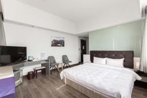 TV a/nebo společenská místnost v ubytování Tien Hsiang Lin Sea Dragon King Hotel