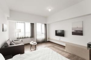 TV a/nebo společenská místnost v ubytování Tien Hsiang Lin Sea Dragon King Hotel