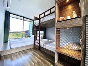Postel nebo postele na pokoji v ubytování Boxinn The Kontena Home + 37 fotografií