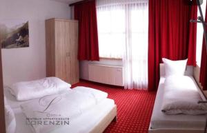 Krevet ili kreveti u jedinici u okviru objekta Zentrum Appartements Lorenzin +8 fotografija