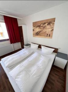 Krevet ili kreveti u jedinici u okviru objekta Zentrum Appartements Lorenzin
