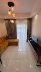TV a/nebo společenská místnost v ubytování Duplex apartment in Alanya, Mahmutlar