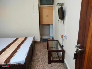 Postel nebo postele na pokoji v ubytování Hotel Embassy