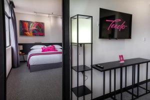 Postel nebo postele na pokoji v ubytování TEEDO Hotel Kuala Lumpur