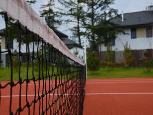 Tenis lub squash w obiekcie Equilibrium Apartments lub w pobliżu