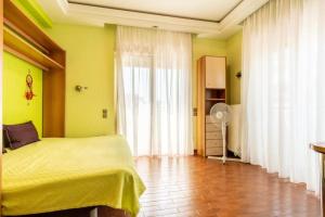Postel nebo postele na pokoji v ubytování Villa Palatium