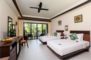 Postel nebo postele na pokoji v ubytování Nang Thong Bay Resort