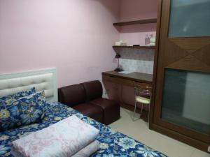 Letto o letti in una camera di 永春棧Kozzy Apartment
