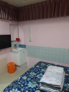 Letto o letti in una camera di 永春棧Kozzy Apartment