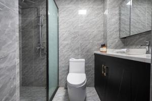 Koupelna v ubytování Suyi Hotel Apartment