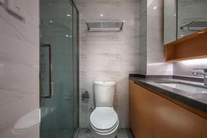 Koupelna v ubytování Suyi Hotel Apartment