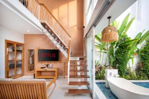 TV/Unterhaltungsangebot in der Unterkunft Aeera Villa Canggu by Ini Vie Hospitality