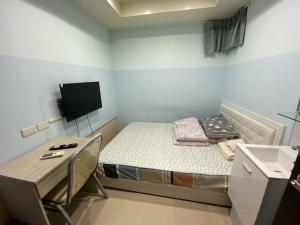 TV o dispositivi per l'intrattenimento presso 永春棧Kozzy Apartment