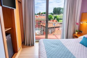 Hotel Faranda Marsol Candas, Ascend Hotel Collection客房内的一张或多张床位