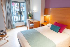 Hotel Faranda Marsol Candas, Ascend Hotel Collection客房内的一张或多张床位