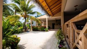 Zahrada ubytování Beach Lily Dhigurah
