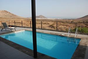 Basen w obiekcie EL TUCAN, Vistas en 3 dormitorios y piscina lub w pobliżu