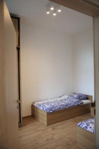 a bedroom with two beds in a room at Dom Studenta Pod Jelonkiem in Jelenia Góra