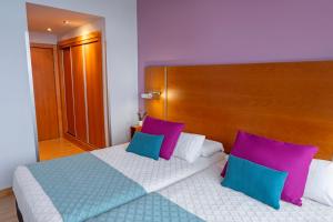 Hotel Faranda Marsol Candas, Ascend Hotel Collection客房内的一张或多张床位