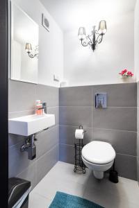 Kúpeľňa v ubytovaní Victus Apartamenty, Apartament Royal