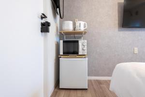 Köök või kööginurk majutusasutuses 東新宿 1008 +37 fotot