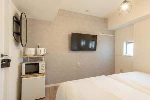 Köök või kööginurk majutusasutuses 東新宿 1008