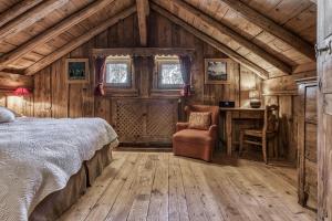 Ένα ή περισσότερα κρεβάτια σε δωμάτιο στο Chalet Persan