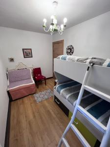 A bed or beds in a room at Casa turística ''Los chaleco'' en Lumbreras con terraza privada.