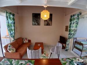 Zona d'estar a Ti Repos Martinique - maison avec Spa