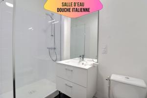 a white bathroom with a sink and a shower at Le logis de Madeleine - ideal couple / solo - coeur de la ville - proche gare in Troyes
