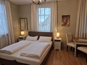 Postel nebo postele na pokoji v ubytování Hotel-Gasthof Opel