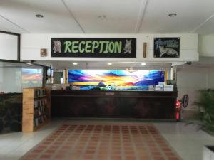 a restaurant with a large screen television in a building at Lanta Island Resort in Ko Lanta +110 photos