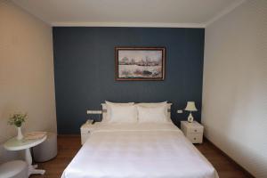 Postel nebo postele na pokoji v ubytování Hotel Du Lys