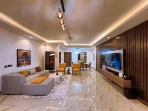 Posezení v ubytování a3 nes luxury apartment