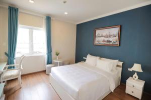 Postel nebo postele na pokoji v ubytování Hotel Du Lys