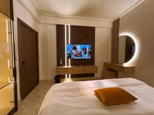 TV a/nebo společenská místnost v ubytování a3 nes luxury apartment