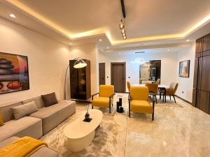 Posezení v ubytování a3 nes luxury apartment