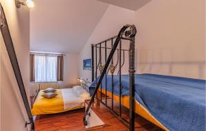 Postel nebo postele na pokoji v ubytování Two-Bedroom Apartment In Medulin