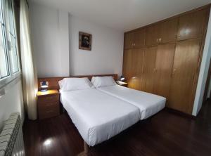 Łóżko lub łóżka w pokoju w obiekcie Hotel Hórreo by Bossh! Hotels