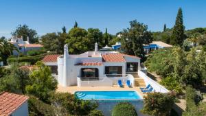 an aerial view of a house with a swimming pool at Carosim - Quiet location, close to beach, private in Poço Partido