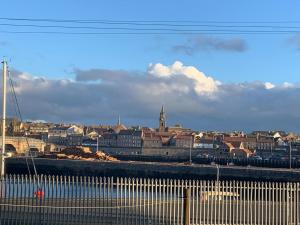 a view of a city with a town in the background at Harbour Haven in Berwick-Upon-Tweed